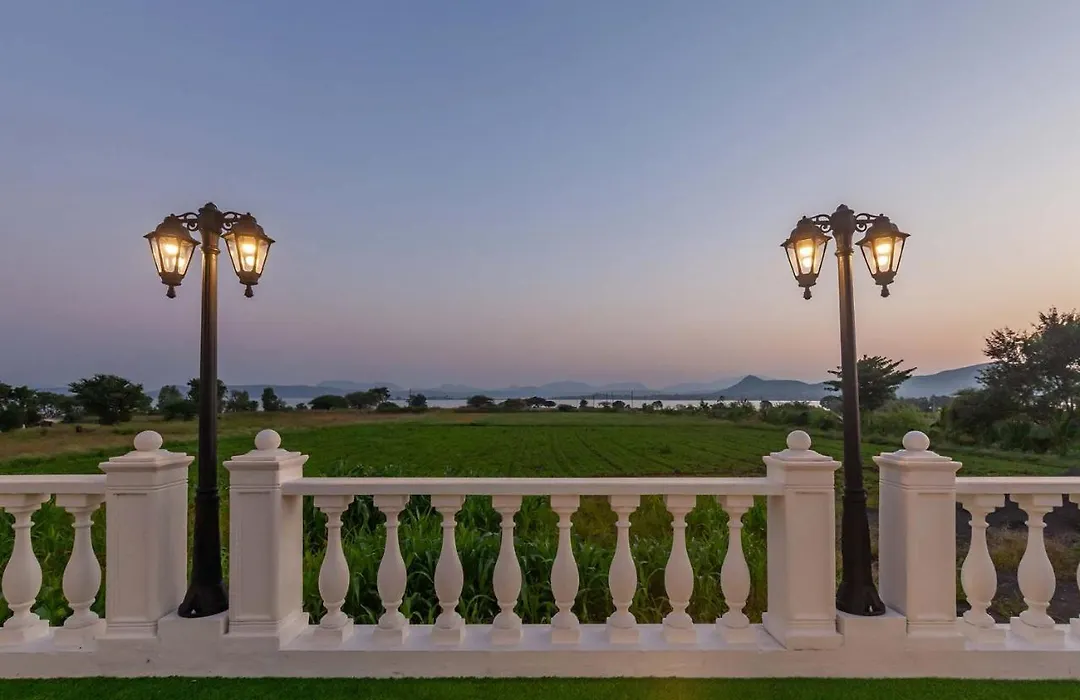 Stayvista's Lake La Vie: Tranquil Lakeside Villa with Pool and Farmland Views-1